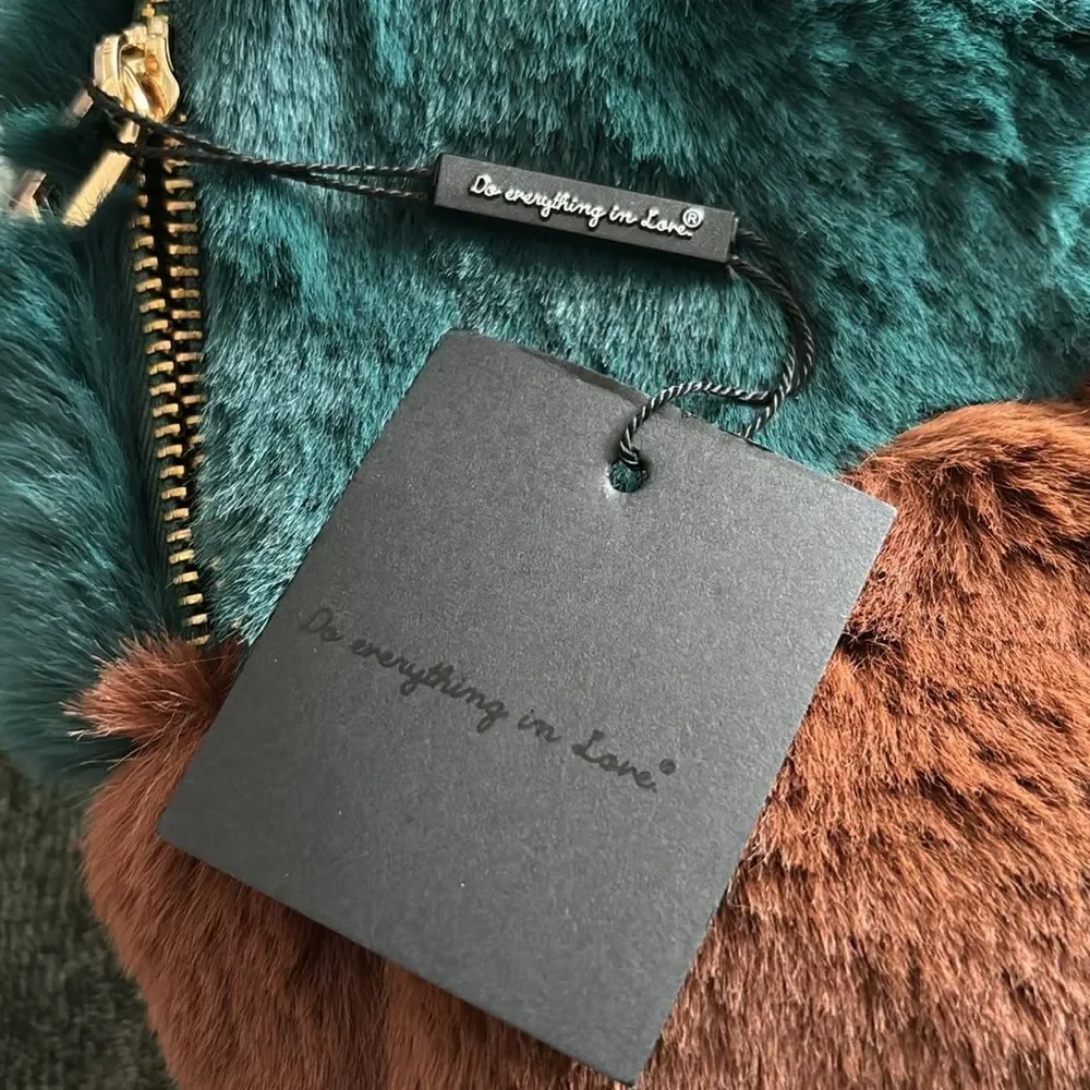 Do Everything in love faux fur back pack NWT
